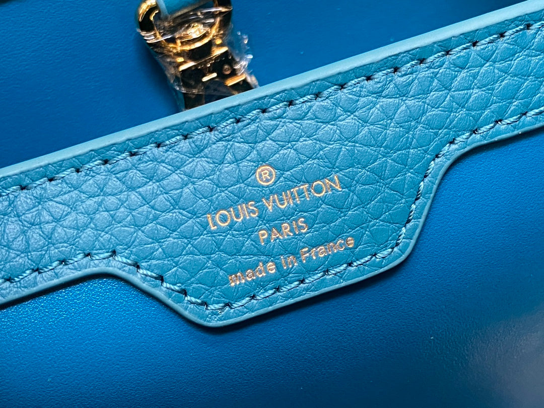 CAPUCINES BB 27 BLUE TAURILLON GOLD HARDWARE