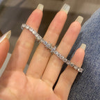 [Clover Schmuck]Luxuriöses, aufwendig verziertes Tennisarmband mit runden Brillanten