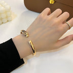 [クローバージュエリー]パンテール ゴールド オープンブレスレット