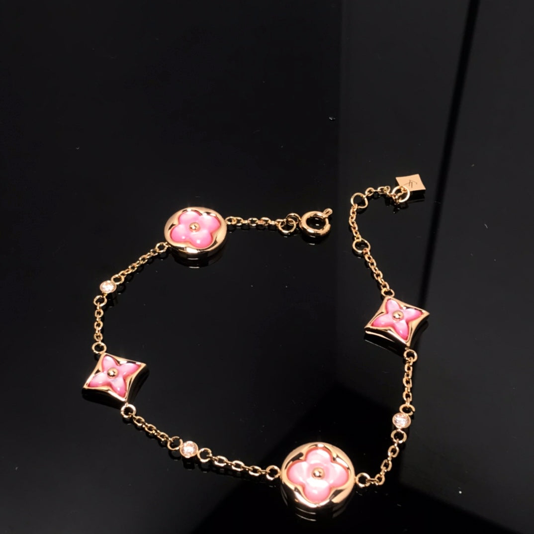 [Clover Jewellery] Armband mit Stern- und Sonnenmotiv, 4 Motive, rosa Perlmutt, Roségold 