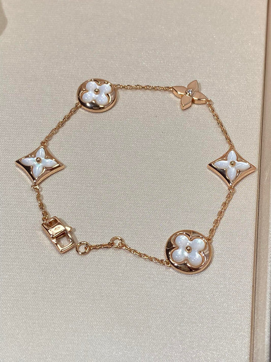 [Clover Jewelery]STAR AND SUN 5 MOTIF MOP PINK GOLD BRACELET