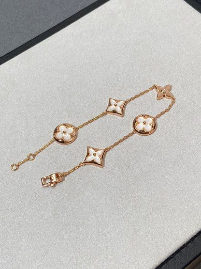 [Clover Jewelery]STAR AND SUN 5 MOTIF MOP PINK GOLD BRACELET