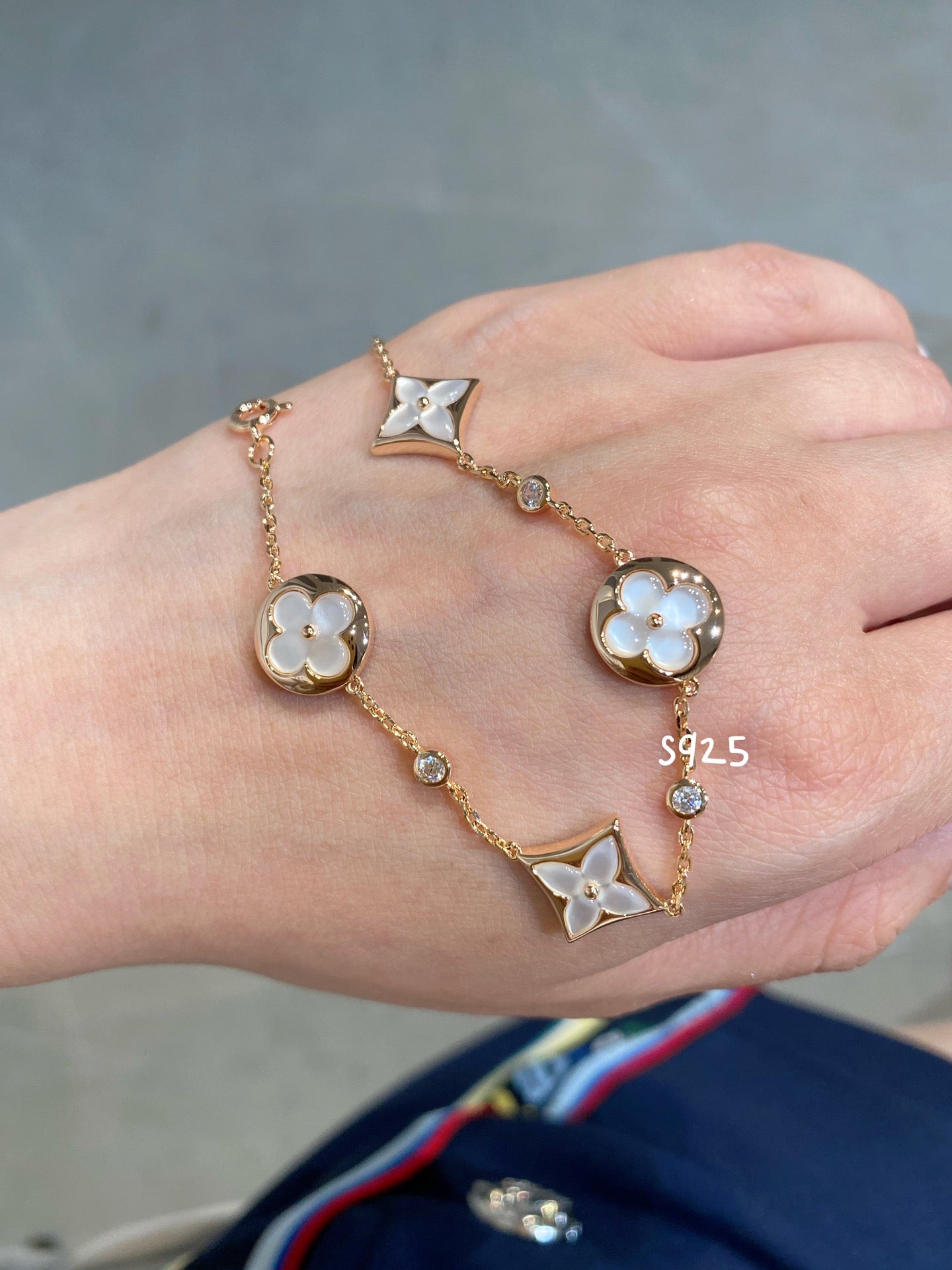 [Clover Jewelery]STAR AND SUN 4 MOTIF WHITE MOP PINK GOLD BRACELET