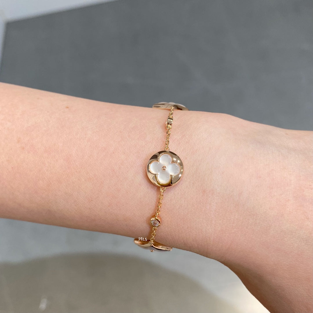 [Clover Jewelery]STAR AND SUN 4 MOTIF WHITE MOP PINK GOLD BRACELET