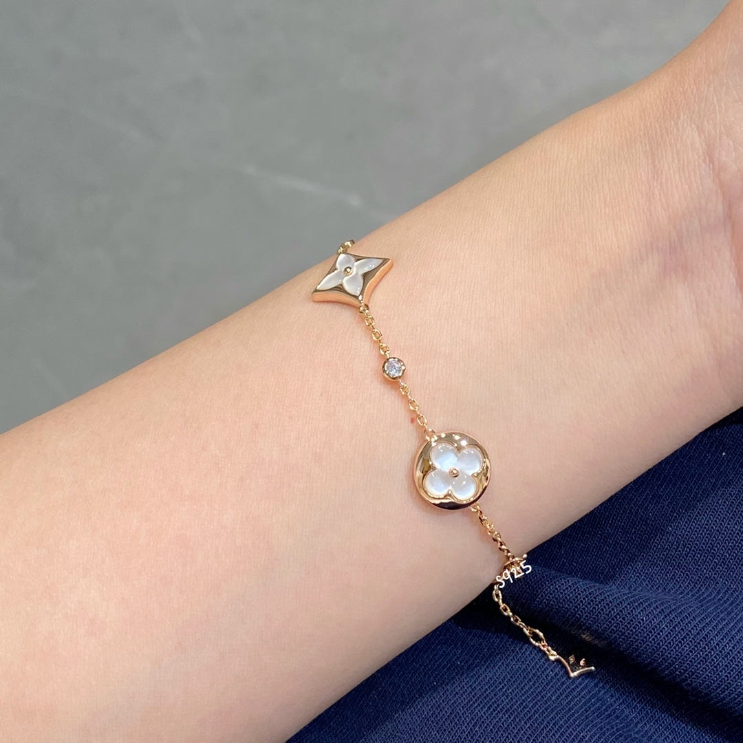 [Clover Jewelery]STAR AND SUN 4 MOTIF WHITE MOP PINK GOLD BRACELET