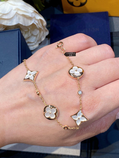[Clover Jewelery]STAR AND SUN 4 MOTIF WHITE MOP PINK GOLD BRACELET