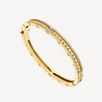 {"brand":"Clover Jewelry","name":"ZERO 1 SPIRAL- UND PAVÉ-DIAMANTEN-GOLDARMBAND"}