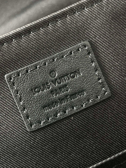 MESSENGER VOYAGER PM 33 IN GUN METAL MONOGRAM ECLIPSE CANVAS