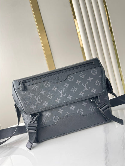 MESSENGER VOYAGER PM 33 IN GUN METAL MONOGRAM ECLIPSE CANVAS
