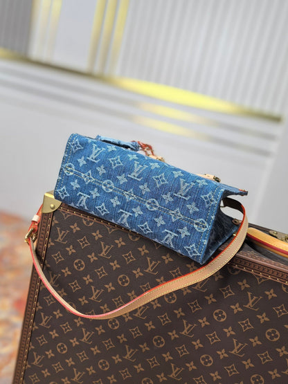 LV 25S ONTHEGO 28 IN BLUE MONOGRAM DENIM COTTON CALFSKIN LEATHER STRAP