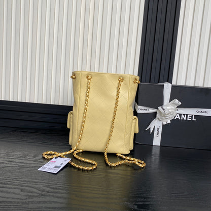 CRUISE DRAWSTRING BACKPACK 24 IN YELLOW LAMBSKIN GOLD-TONE METALLIC