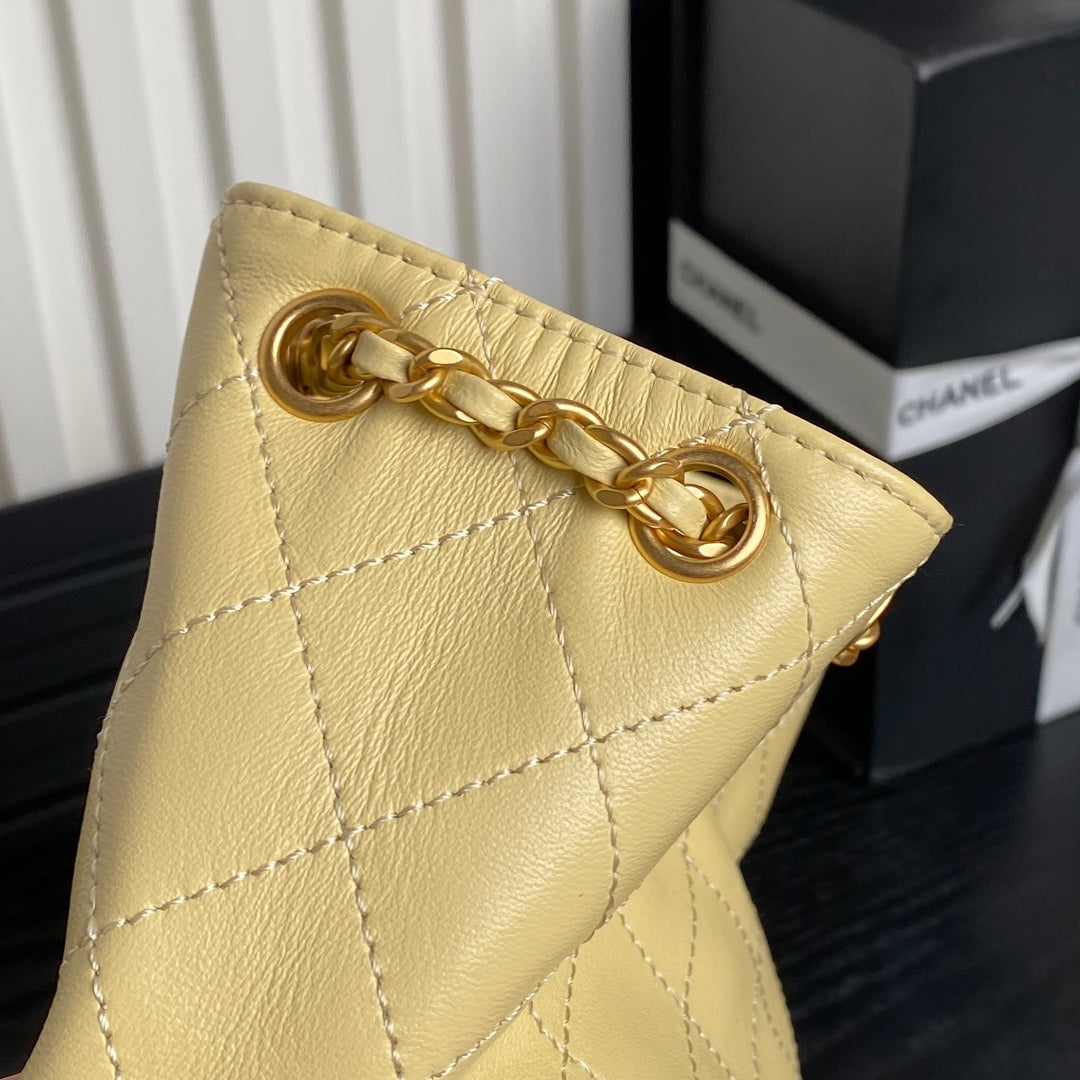 CRUISE DRAWSTRING BACKPACK 24 IN YELLOW LAMBSKIN GOLD-TONE METALLIC