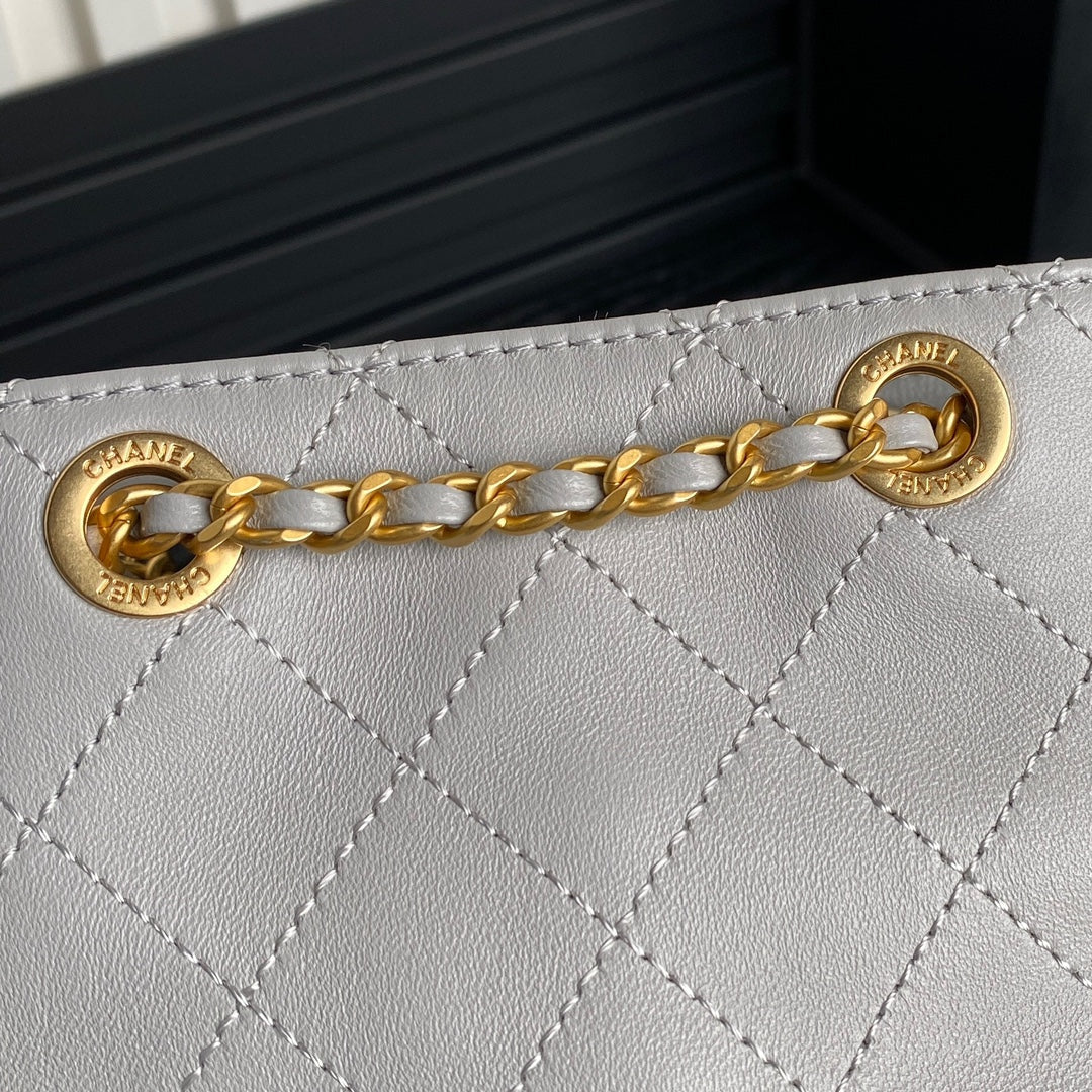 CRUISE DRAWSTRING BACKPACK 24 IN GREY LAMBSKIN GOLD-TONE METALLIC